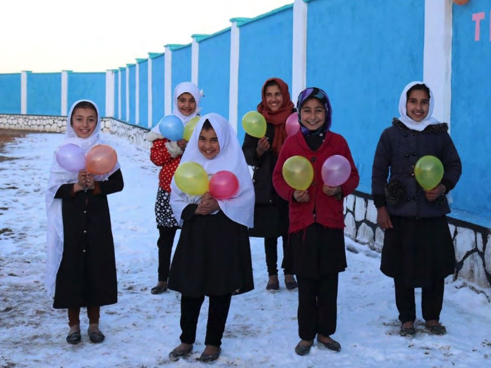 Afghanistan girls inside wall built with funds from Avaya