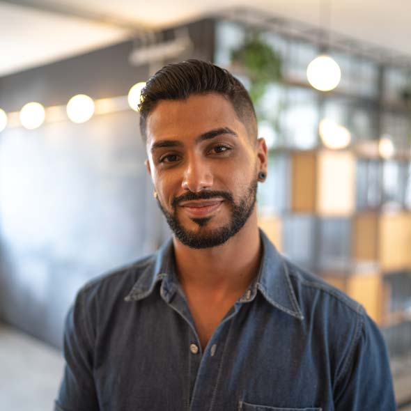 Latino man standing at work studio