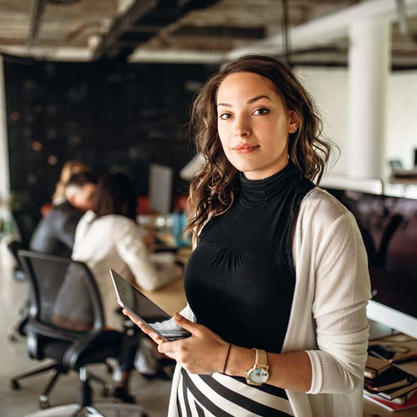 Young business woman in the office