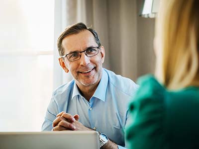 Smiling older man with glasses