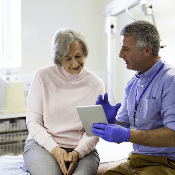 woman and doctor with table